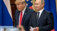 HELSINKI, FINLAND - JULY 16:  U.S. President Donald Trump (L) and Russian President Vladimir Putin arrive to waiting media during a joint press conference after their summit on July 16, 2018 in Helsinki, Finland. The two leaders met one-on-one and discussed a range of issues including the 2016 U.S Election collusion.  (Photo by Chris McGrath/Getty Images) *** Local Caption *** Donald Trump: Vladimir Putin