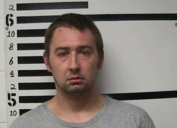 Mugshot of Austin Drummond.