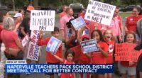 Rally held ahead of crowded Naperville 203 board meeting amid battle over contact, with Naperville teachers strike possible