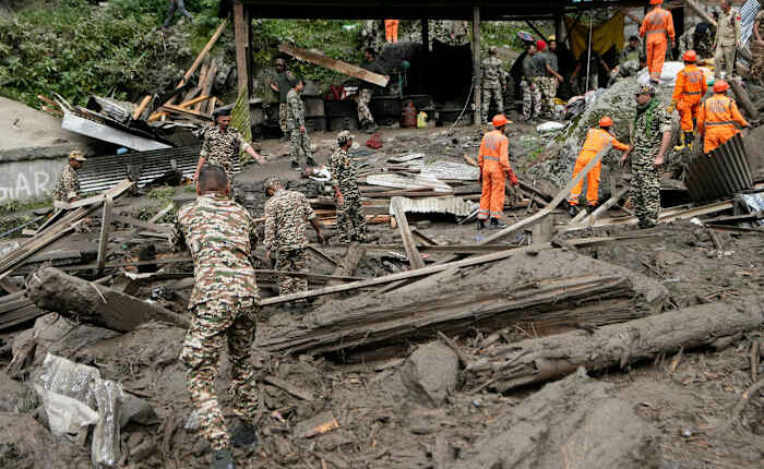 Rescuers search for missing flash flood victims in remote Kashmir village