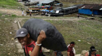 Residents of a remote island disputed by Colombia hope their Peruvian government won't forget them