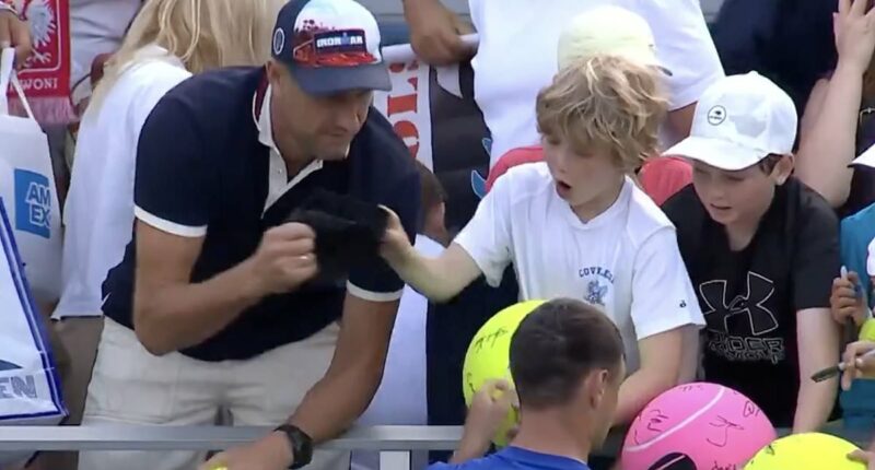 Revealed: The millionaire CEO who snatched US Open star's hat from boy