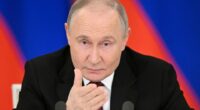 Vladimir Putin giving a statement to the media.