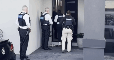 Counter-terrorism police have charged a second man over an arson attack at the Adass Israel Synagogue in Melbourne.