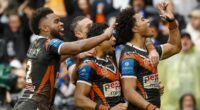See the photo that shows the OTHER side of the scandal over NRL stars giving fans the 'Arab middle finger' as club's supporters are branded hypocrites