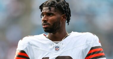 Shedeur Sanders celebrates his first NFL touchdown pass