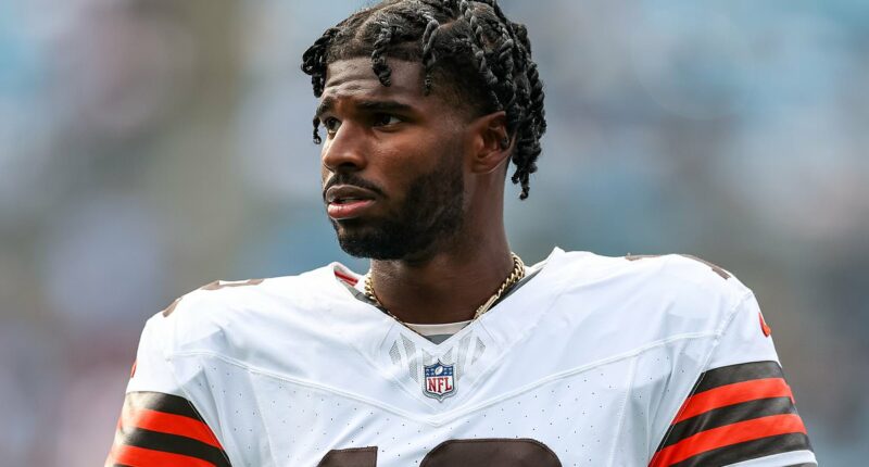 Shedeur Sanders celebrates his first NFL touchdown pass