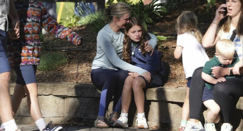 Shooter 'guns down TWENTY' at Catholic school mass