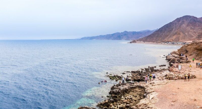 Tourists at the Blue Hole in Dahab, Egypt.