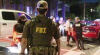 Streets of fear as heavily armed troops hit the ground