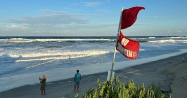 Summer celebrations meet closed beaches and warnings on US East Coast due to Hurricane Erin