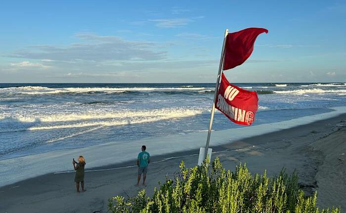 Summer celebrations meet closed beaches and warnings on US East Coast due to Hurricane Erin