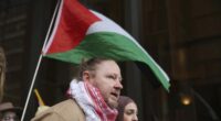 Josh Lees speaks to reporters outside the supreme court after winning the right to march across Sydney Harbour Bridge in support of Palestine tomorrow.