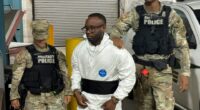 Sgt. Quornelius Radford, a shooting suspect, escorted by military police.