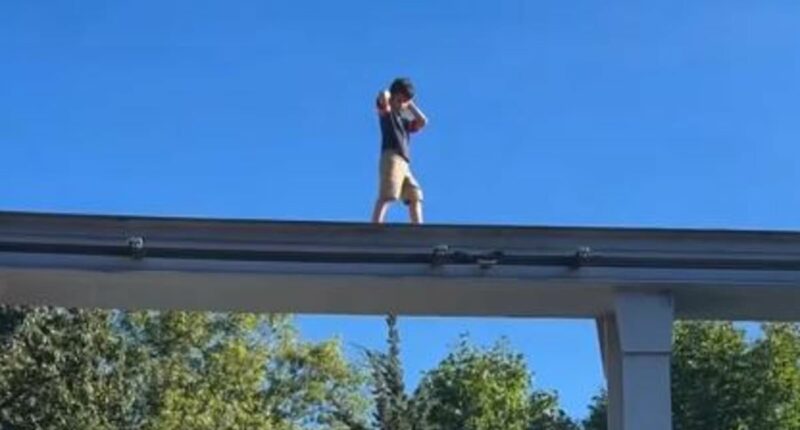 Terrifying moment lone child nearly falls off rail at Hersheypark