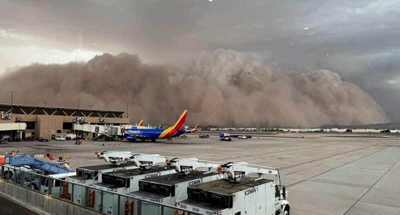 Towering wall of dust rolls through metro Phoenix, leaving thousands without power