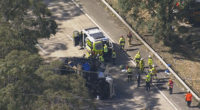 The driver was "severely injured and trappedï»¿" in a truck after the accident on the motorway at Calga.
