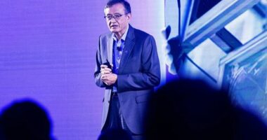 Intel CEO Lip Bu-Tan speaking at a conference.