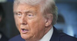 Trump signs orders targeting cashless bail, flag burning