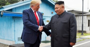President Donald Trump shaking hands with North Korean leader Kim Jong Un at the border village of Panmunjom.