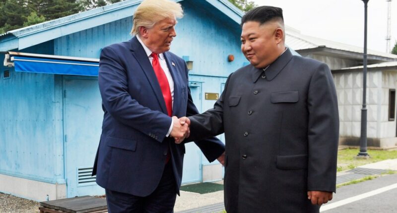 President Donald Trump shaking hands with North Korean leader Kim Jong Un at the border village of Panmunjom.