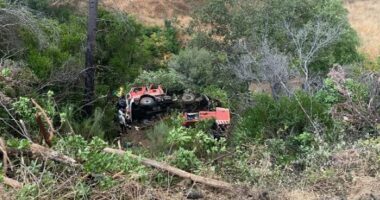 Firetruck accident scene with two fatalities and three serious injuries.