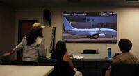 US deportation flights hit record highs as carriers try to hide the planes, advocates say