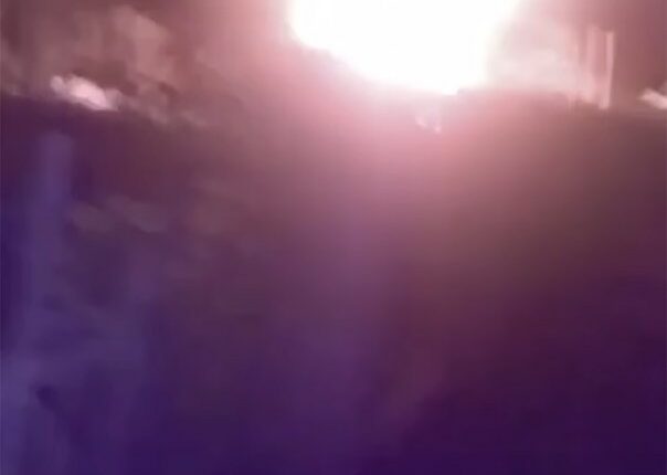 Image of a bright light, possibly an explosion, with the Ukrainian GUR military intelligence logo.