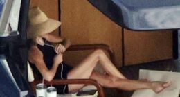 Victoria Beckham basks in a swimsuit while David dives into new read
