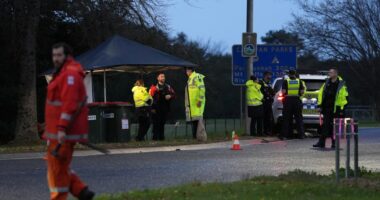 Police officers at a crime scene.