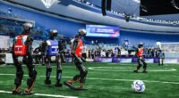 Humanoid robots playing soccer at the World Humanoid Robot Games.