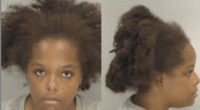 Woman charged with child cruelty after 1-year-old's death