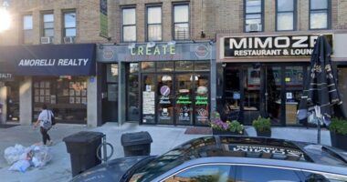 Street-level view of Create Fresh Vibrant Foods, Amorelli Realty, and Mimosa Restaurant & Lounge in Astoria, NYC.