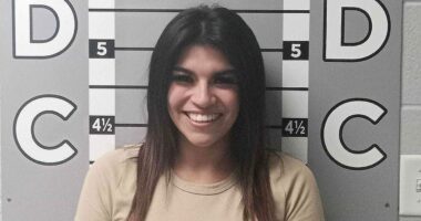 Woman's smiling mugshot goes viral after alleged $12K car vandalism spree against ex-boyfriend