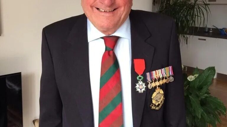 Cyril Bird in military jacket and beret.