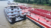 2 dead after helicopter crashes into Mississippi River barge north of St. Louis