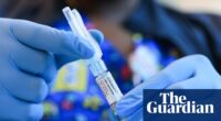 Covid cases rising in US as officials plan to restrict booster vaccines