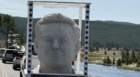 Giant bust of infamous billionaire stops stunned hikers in their tracks at Yellowstone National Park