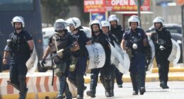 Israeli cruise ship passengers 'run for their lives after being attacked by pro-Palestine protesters' while disembarking on Greek island