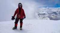 Natalia Nagovitsina, a Russian climber, on a snowy mountaintop.
