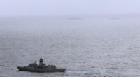The HMAS Arunta, left, shadows the People's Liberation Army-Navy Jiangkai-class frigate Hengyang and a Fuchi-class replenishment vessel in the Tasman Sea, on Feb. 13, 2025.