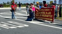 Anti-ICE protesters gather in front of Hyundai facility