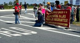 Anti-ICE protesters gather in front of Hyundai facility
