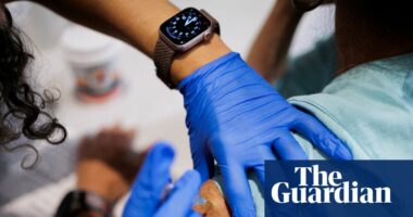 As Covid surges in the US, Americans can’t get vaccinated: ‘terrified I might kill somebody’