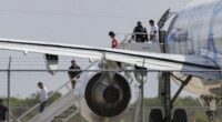As Guatemalan kids sit in planes on tarmac, judge orders they stay in the US, for now