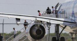 As Guatemalan kids sit in planes on tarmac, judge orders they stay in the US, for now