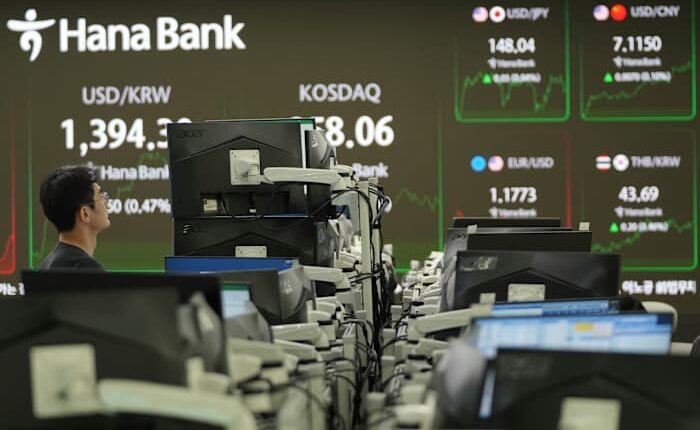 Asian shares retreat after Intel helped drive Wall Street to more records