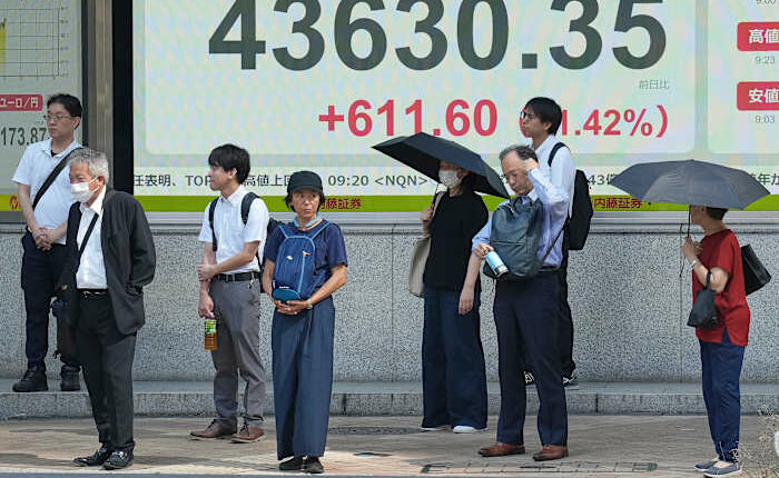 Asian shares rise after Japan's prime minister resigns