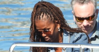 Barack and Michelle Obama arrive apart on Spielberg's yacht