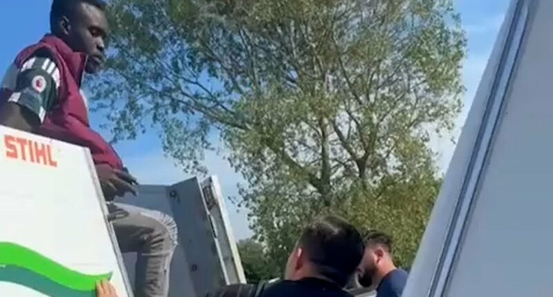British family finds 'migrant stowaways' hidden in their trailer